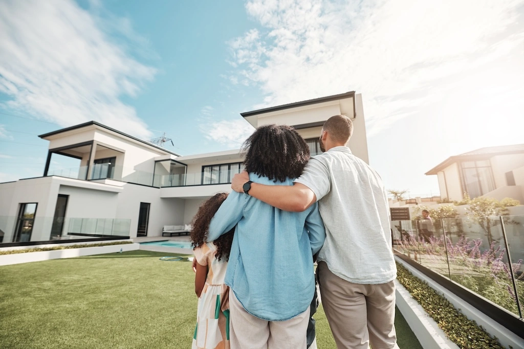 A family looking at newly built house.